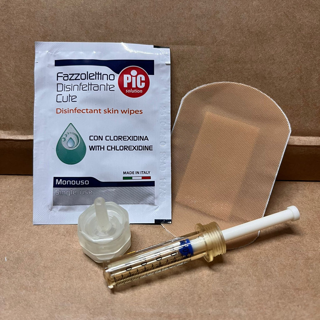 Componenti del kit senza ago Comfort-In: ricariche Noozle, adattatori, salviettine disinfettanti e cerotti